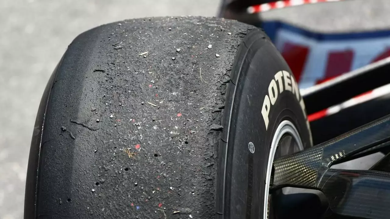 Why don't race cars use water filled tires?